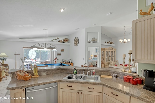 kitchen with sink, a notable chandelier, dishwasher, hanging light fixtures, and lofted ceiling