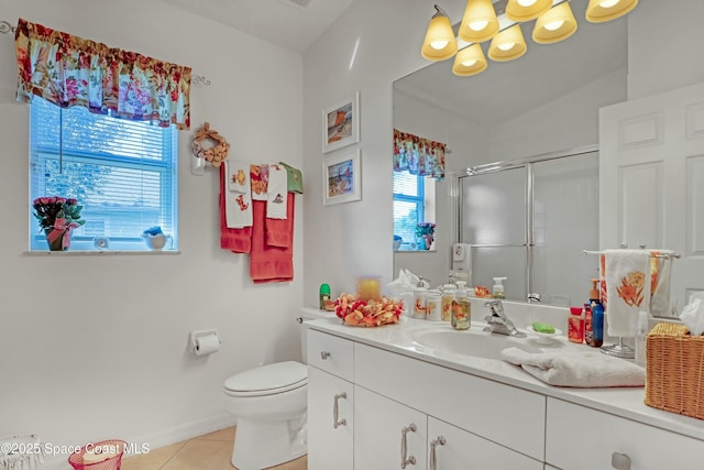 bathroom with vanity, a shower with door, lofted ceiling, tile patterned floors, and toilet