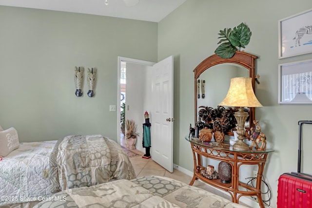 bedroom featuring light tile patterned floors