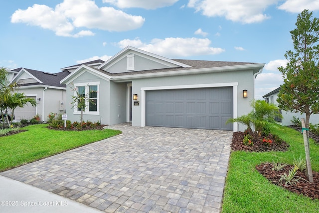 view of front facade featuring a front lawn and a garage