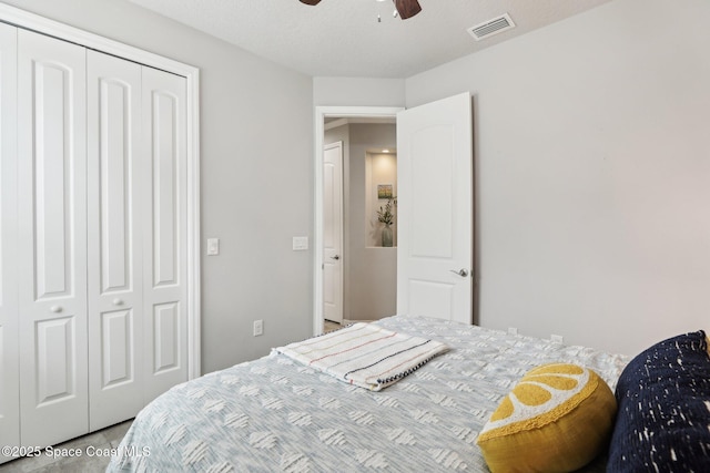 bedroom with a closet and ceiling fan