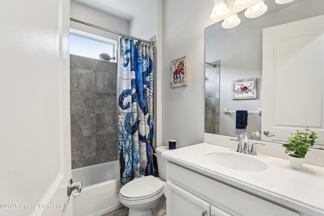 full bathroom featuring toilet, shower / tub combo, and vanity