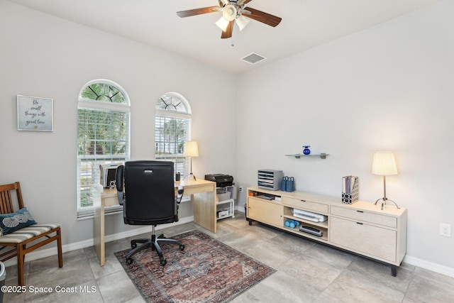 office space with ceiling fan