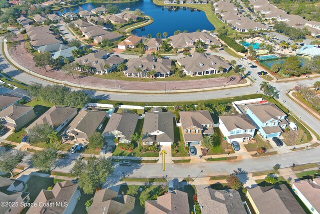 bird's eye view with a water view