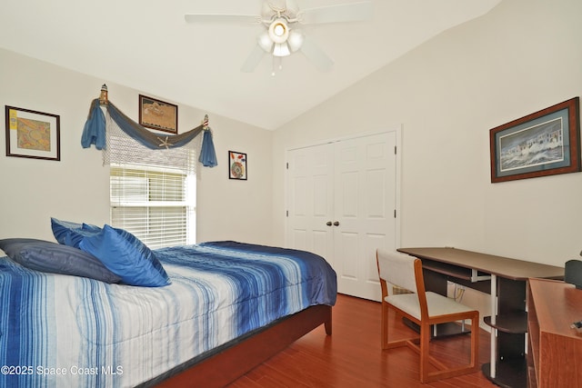 bedroom featuring ceiling fan, hardwood / wood-style floors, a closet, and vaulted ceiling