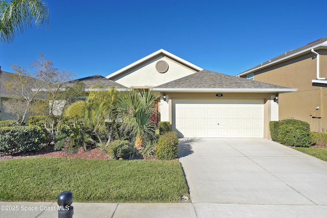 ranch-style house featuring a garage