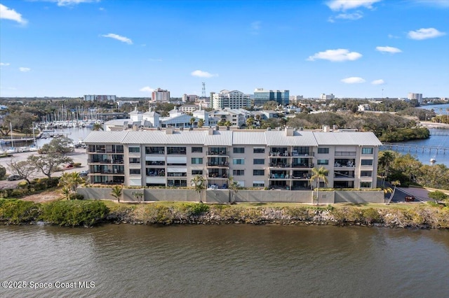 birds eye view of property featuring a water view