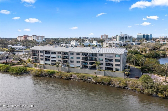 drone / aerial view featuring a water view