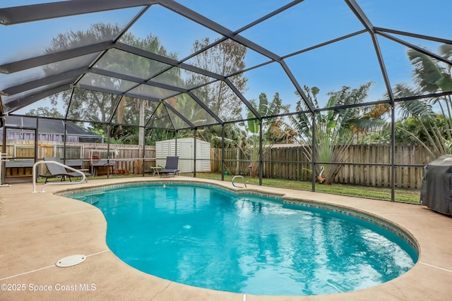 view of pool featuring a lanai, a grill, a storage shed, and a patio