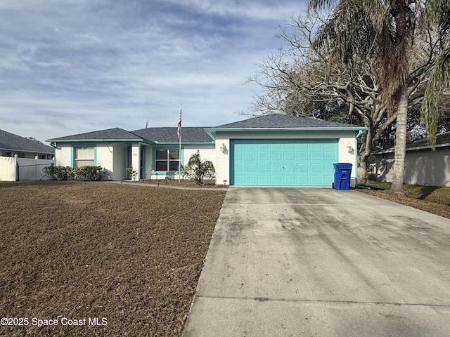 ranch-style home with a garage and a front yard