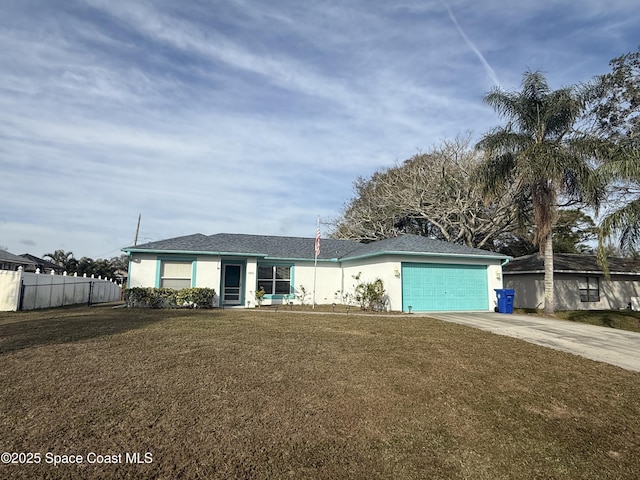 ranch-style house with a garage and a front lawn