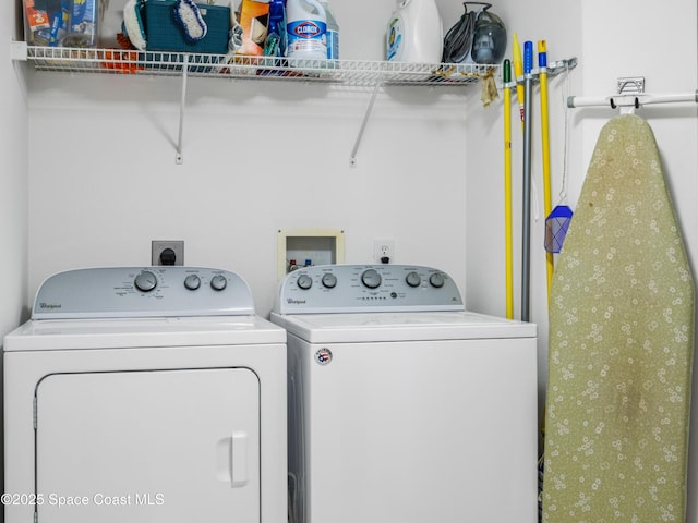 laundry area with separate washer and dryer