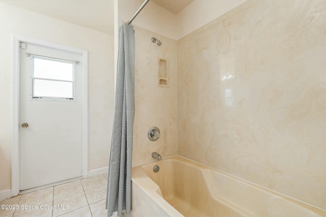 bathroom featuring tile patterned floors and shower / bath combo