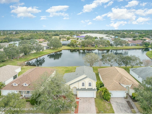 birds eye view of property featuring a water view