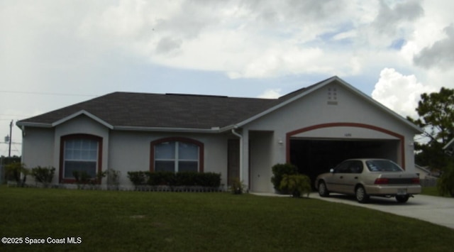 single story home featuring a front yard and a garage