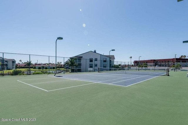 view of sport court featuring basketball court