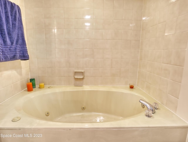 bathroom with a bathing tub