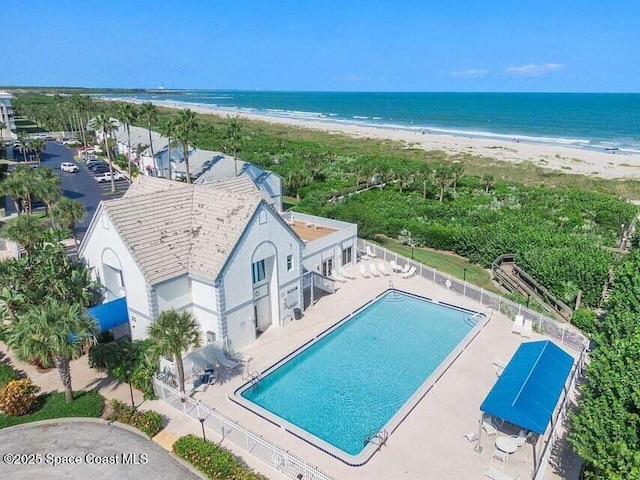 aerial view with a beach view and a water view