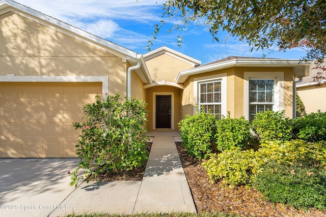 property entrance with a garage