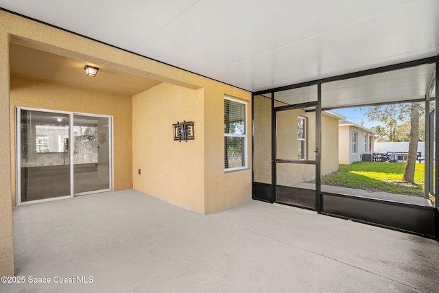 view of unfurnished sunroom