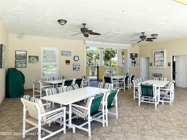 dining room featuring ceiling fan