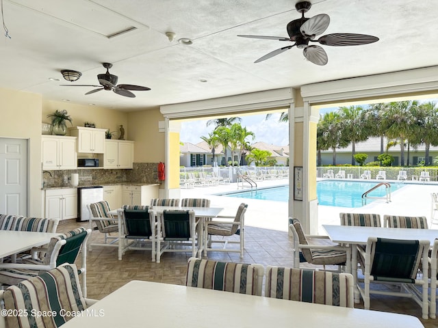 exterior space with parquet flooring and ceiling fan