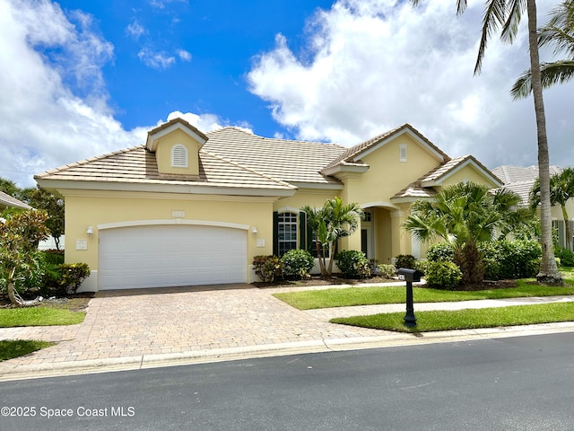 view of front of house with a garage