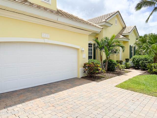 view of front of home with a garage