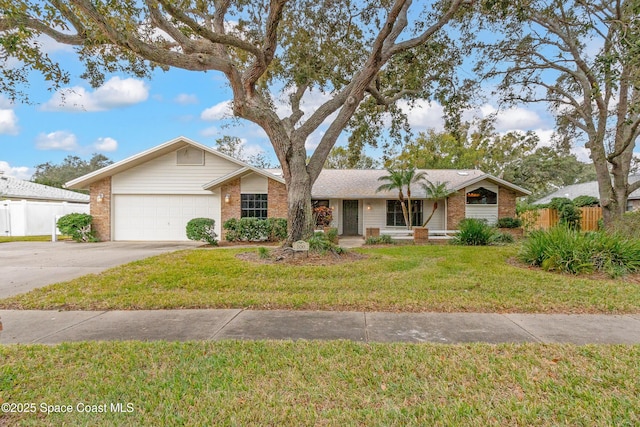 ranch-style house with a front yard and a garage