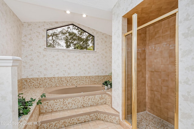 bathroom featuring plus walk in shower and tile patterned flooring