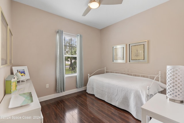 bedroom featuring ceiling fan and dark wood-type flooring