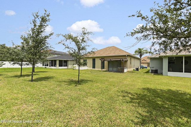 view of yard featuring central AC