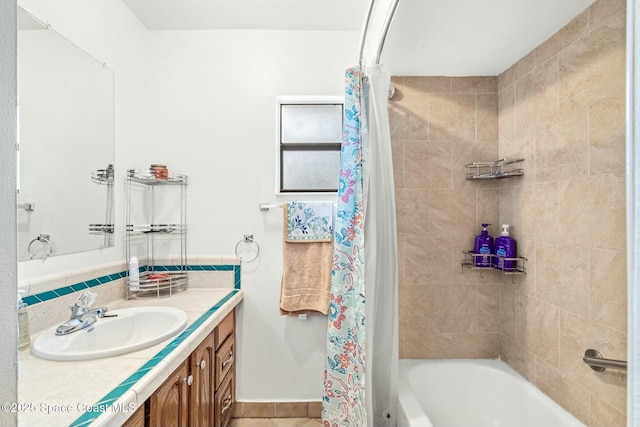 bathroom featuring shower / bathtub combination with curtain and vanity