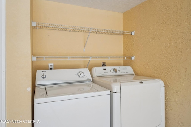 laundry area featuring washer and clothes dryer