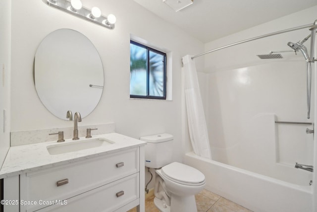 full bathroom with vanity, shower / bath combo with shower curtain, tile patterned floors, and toilet