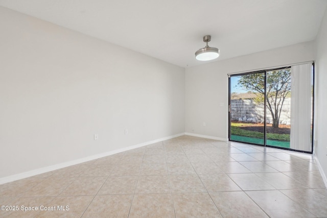 empty room featuring light tile patterned floors