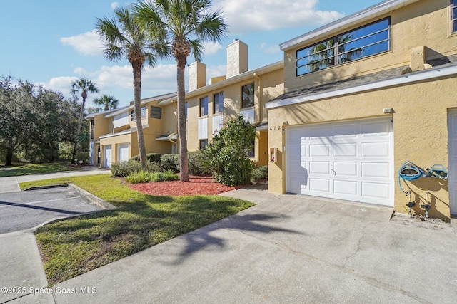 view of property featuring a garage