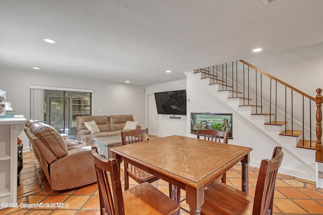 dining space with light tile patterned floors