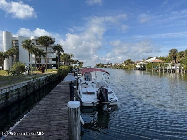 dock area featuring a water view