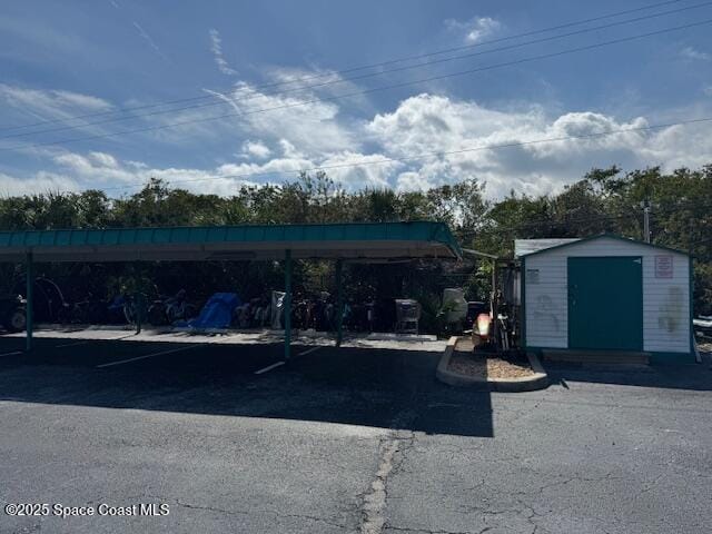 view of parking with a carport