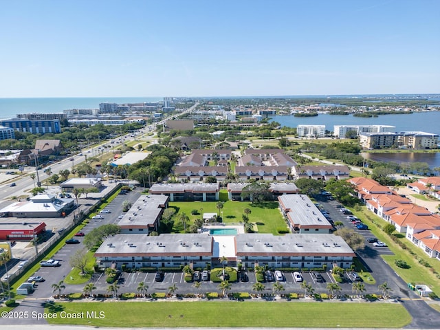 bird's eye view with a water view