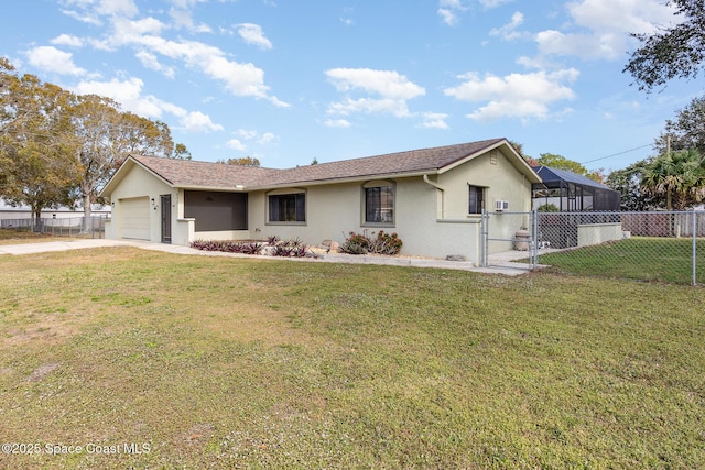 ranch-style house featuring glass enclosure, a front lawn, and a garage