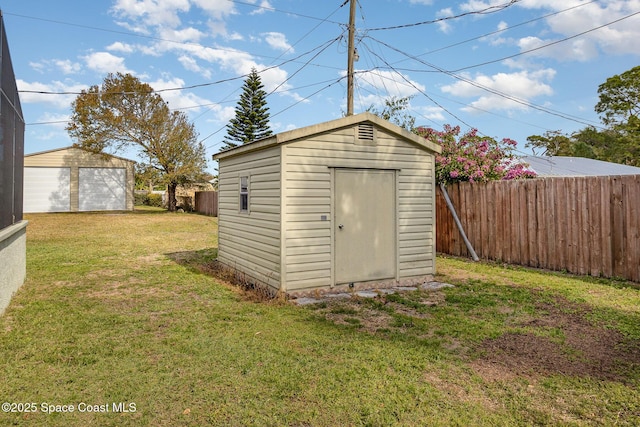 view of outbuilding with a lawn