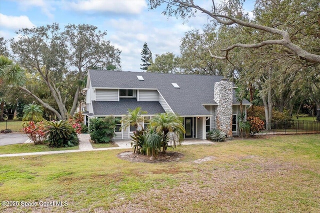 view of front of property with a front lawn