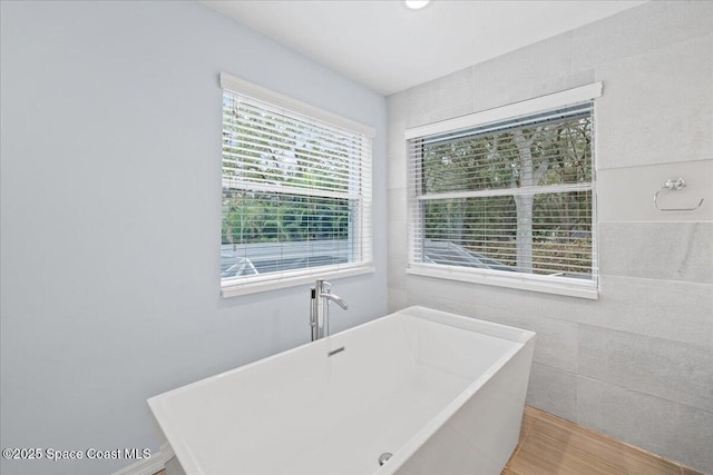 bathroom with a bathtub and sink