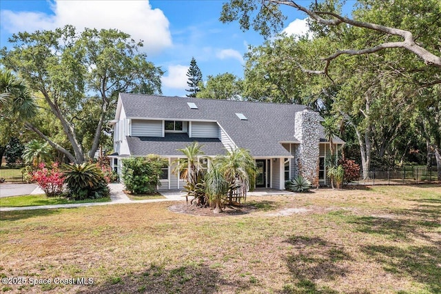 145 Crispin St, Merritt Island, FL 32952 - view of front facade with roof with shingles