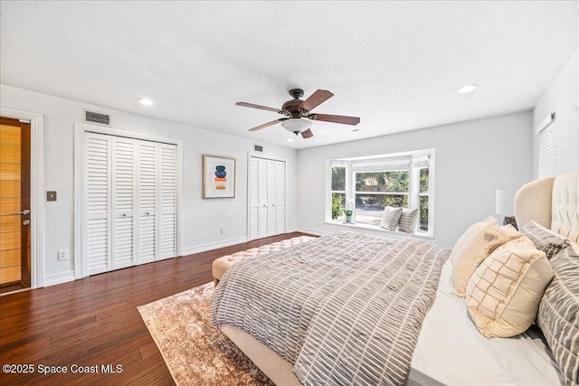 145 Crispin St, Merritt Island, FL 32952 - bedroom with wood finished floors, baseboards, recessed lighting, multiple closets, and ceiling fan
