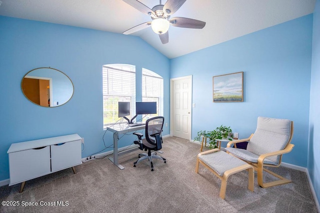 carpeted office space with lofted ceiling and ceiling fan