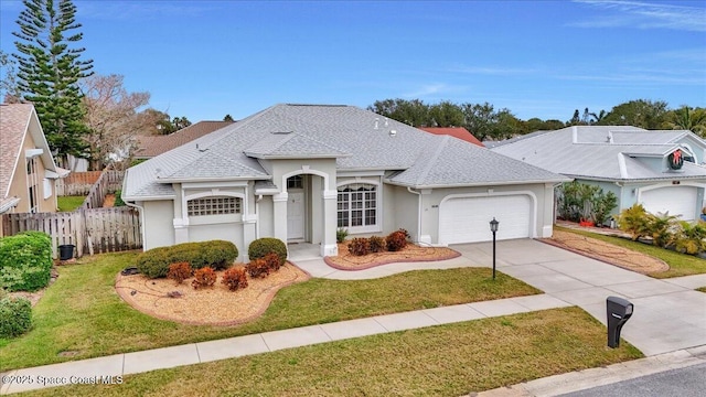 ranch-style house with a front yard and a garage