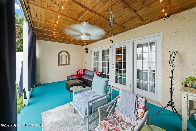 view of patio / terrace with french doors and ceiling fan